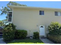 Charming condo featuring a private balcony and well-maintained landscaping at 5564 Slash Pine Ct # 4, Orlando, FL 32811