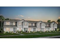 Charming townhomes boasting a landscaped lawn and a welcoming curb appeal perfect for modern living at 10282 Hadley St, Orlando, FL 32829