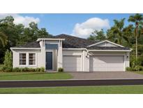 Charming single-story home with a three-car garage and a well-manicured lawn at 2299 Rider Rain Ln, Apopka, FL 32703