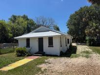 Charming single-story home featuring a new metal roof and a small front yard at 3629 Main St, Sanford, FL 32771