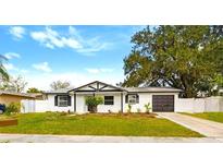 Charming single-story home featuring fresh exterior paint, landscaped yard, and a driveway leading to a one car garage at 7331 Blue Jacket W Pl, Winter Park, FL 32792