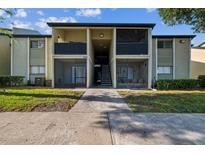 Inviting condo building with well-maintained lawn and easy access to units at 936 Lake Destiny Rd # G, Altamonte Springs, FL 32714
