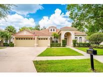 Charming single-Gathering home with a well-manicured lawn and inviting curb appeal at 2000 Bloomsbury Run, Lake Mary, FL 32746