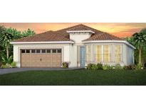 Beautiful home featuring a tile roof, attached two car garage, and well-manicured lawn at 2674 Midsweet Ave, St Cloud, FL 34772