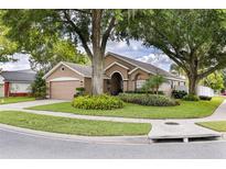 Charming single-story home with well-maintained landscaping and a two-car garage at 2737 Cahill Way, Lake Mary, FL 32746