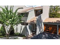Inviting exterior showcasing modern architecture with mature landscaping and a private entrance at 386 Lakeview St, Orlando, FL 32804