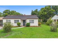 Charming single-story home features a well-maintained lawn and cozy facade at 3702 Starks St, Orlando, FL 32805