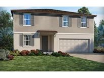 Charming two-story home featuring a two-car garage, neutral color palette, and well-maintained landscaping at 3896 Giorgio Dr, Winter Haven, FL 33884