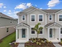 Charming townhome with manicured landscaping, inviting facade, and a well-maintained exterior at 3251 Gardenia Reserve St, Apopka, FL 32712