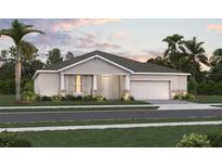 Charming one-story home with well-manicured lawn, stone accents and an attached two car garage at 3004 Water Clover Ct, Apopka, FL 32712