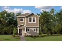 Charming two-story home with neutral color palette, a covered porch and a well maintained lawn at 7227 Sienna Oak Aly, Orlando, FL 32829