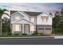 Charming two-story home with a covered porch and a two-car garage, showcasing a blend of modern and traditional design at 426 Veneto Cir, Clermont, FL 34715