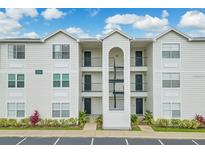 Traditional-style condo featuring three stories and multiple entrances at 2550 Alafaya Trl # 9303, Orlando, FL 32826