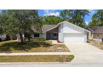 Charming single-Gathering home with well-maintained lawn and attached two-car garage at 116 Morning Glory Dr, Lake Mary, FL 32746