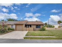 Charming single-story home features a one-car garage, tidy lawn, and inviting curb appeal at 3153 Greenwood St # Winter Spr, Winter Park, FL 32792