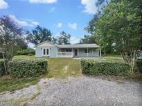Charming single-story home with a spacious front yard and inviting entrance at 1122 Romar Ln, Apopka, FL 32712