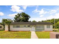 Charming single-story home with a well-manicured lawn and white brick accents at 500 Vereen Dr, Maitland, FL 32751