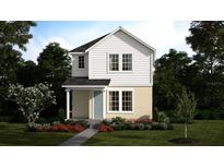 Charming two-story home featuring a light blue front door, white trim, and neatly landscaped front yard at 404 Oak Flat Aly, Groveland, FL 34736