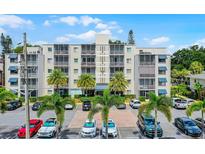 Beautiful condominium building with manicured landscaping and ample parking in a desirable location at 1100 Delaney Ave # F407, Orlando, FL 32806