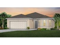 Charming one-story home with a two-car garage, neutral paint, and manicured front lawn at 1543 Timber Leaf Rd, St Cloud, FL 34771