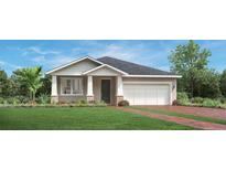 Charming single-story home featuring a two-car garage, landscaped yard, and stylish architectural details at 2727 Arbor Dune Ave, Apopka, FL 32712