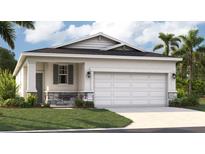 Charming single-Gathering home showcasing a well-manicured lawn and a two-car garage for convenient parking at 3549 Salvia Ct, Tavares, FL 32778