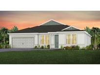 Beautiful single-story home with neutral paint, manicured landscaping, and an attached two-car garage at 5503 Banyan Bay Rd, St Cloud, FL 34771