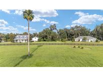 Two homes on a large lot with fenced pastures at 7137 & 7141 S Magnolia Ave, Ocala, FL 34476