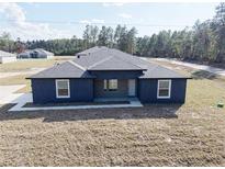 Charming single-story home featuring a modern design and well-maintained lawn in a peaceful neighborhood at 4062 Sw 114Th St, Ocala, FL 34476