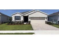 Charming single-Gathering home with a two-car garage, well-maintained lawn, and inviting curb appeal at 4098 Nw 48Th Terrace Rd, Ocala, FL 34482