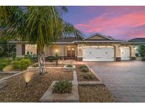 Attractive single-story home with three-car garage and landscaped yard at 9010 Sw 89Th Loop, Ocala, FL 34481