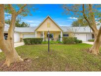 Inviting exterior of a single-story home with a well-manicured lawn at 8738 Sw 90Th St # B, Ocala, FL 34481