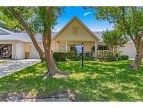 Cute and cozy single story home with a well-maintained lawn at 8738 Sw 90Th St # B, Ocala, FL 34481