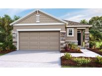 One-story home with stone accents and a two-car garage at 4062 Nw 44Th Cir, Ocala, FL 34482