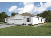 Two-car garage, light grey exterior, and a nicely landscaped lawn at 4736 Nw 39Th Street Rd, Ocala, FL 34482