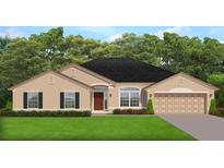 Two-story house with a two-car garage and neutral exterior at 13392 Sw 33Rd Ct, Ocala, FL 34473