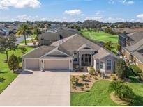 Single-Gathering home with two-car garage and landscaped yard at 3416 Eisenhower Way, The Villages, FL 32163