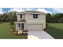 Two-story house with attached garage and landscaping at 8485 Las Palmas Way, Wildwood, FL 34785