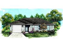 Craftsman style home with a two-car garage and landscaped front yard at 228 Juniper Loop Circle, Ocala, FL 34480
