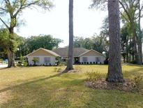Ranch style home with mature landscaping and large yard at 4960 Se 17Th St, Ocala, FL 34471