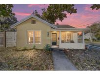 Charming bungalow with front porch and landscaped yard at 114 Ne 11Th Ave, Ocala, FL 34470