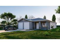 Curb appeal abounds in this 2-car garage home with stone accents at 1336 40Th St, Orlando, FL 32839