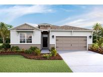 Beautiful single-Gathering home with a 2-car garage, stone accents, manicured lawn, and a welcoming front porch at 4038 Nw 48Th Terrace Rd, Ocala, FL 34482