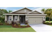 Charming single-Gathering home showcasing a well-manicured lawn and a two-car garage, enhancing curb appeal at 4008 Nw 48Th Terrace Rd, Ocala, FL 34482