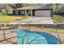 Charming single-story home featuring a black brick facade and a well-maintained front yard with green grass and a private pool at 5906 Sw 108Th St, Ocala, FL 34476