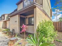 Charming townhome with tidy landscaping and covered front entryway at 3650 Ne 21St St, Ocala, FL 34470