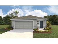 Charming single-story home with a two-car garage and landscaped front yard at 2928 Ne 21St Terrace Rd, Ocala, FL 34470