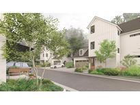 Charming street view showcasing new construction homes with inviting front yards and attached garages at 912 Se 6Th St, Ocala, FL 34471