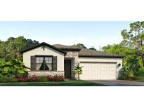 Charming single-story home with stone accents, a two-car garage, and beautifully landscaped front yard at 3084 Canopy Oak Blvd, Wildwood, FL 34785