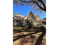 Charming single-story home with a cozy front porch and beautiful landscaping at 9121 Sw 83Rd Ct # C, Ocala, FL 34481